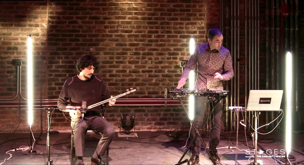 Photo still from Englert Theater concert; videographer: Gabi Vanek